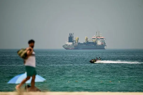 A commercial vessel photographed from the coast of Dubai in April 2020