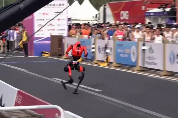 Humanoid robots cut almost two hours off last year's time in the Beijing half marathon