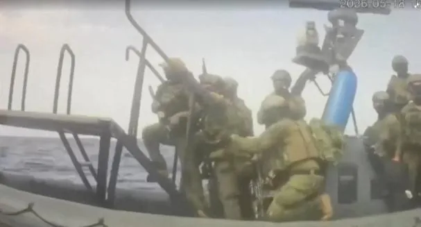 An Israeli navy ship intercepts a vessel of the Global Sumud Flotilla, en route to Gaza