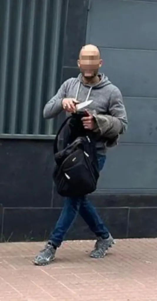 The Esplugues murderer displaying a large knife after committing the crime 
