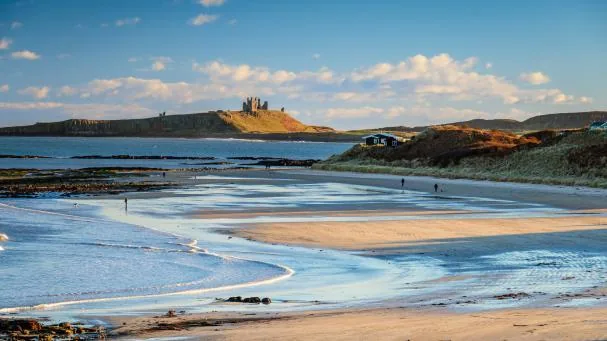 Low Newton Beach and Dunstanburgh Castle, in Northumberland, one of the most beautiful sections of the trail