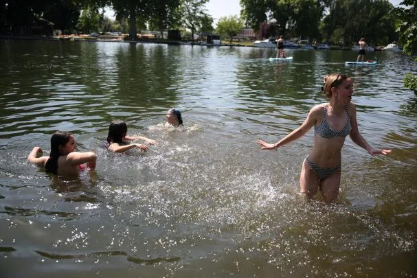 In London, rivers were filled with bathers yesterday. Those Brits are not used to this early heat