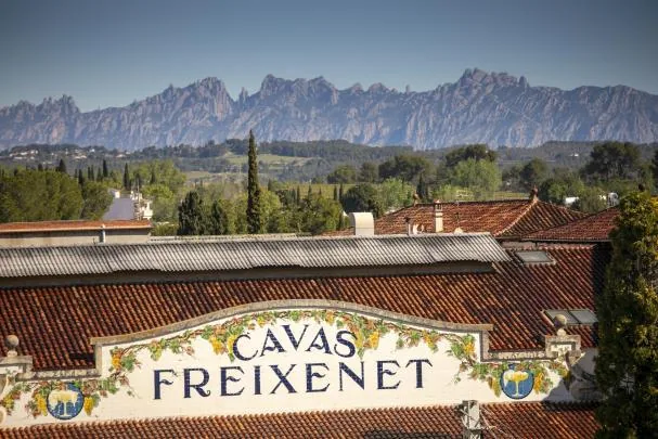 Freixenet headquarters in Sant Sadurní d’Anoia, with Montserrat in the background