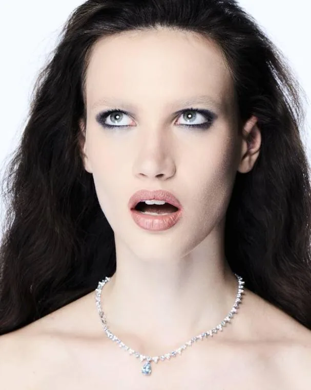 18k white gold riviere necklace with pear-cut aquamarine by Suarez