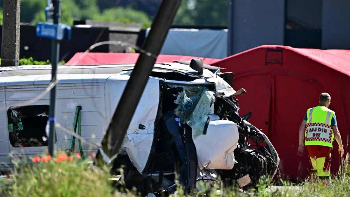 The collision of a train with a school bus in Belgium causes four fatalities