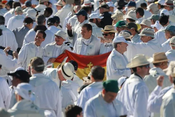 The priests who will concelebrate and distribute communion