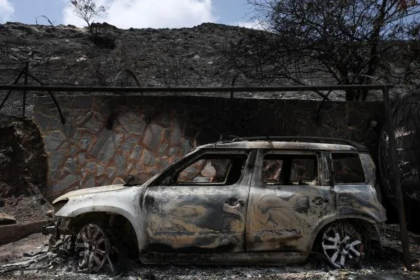 A car burned out in the fire zone in Los Gallardos