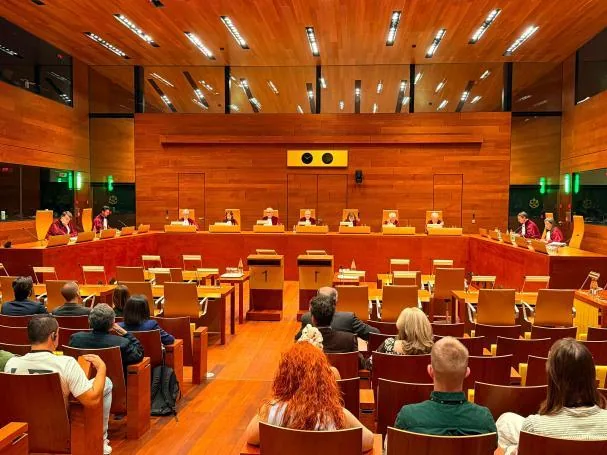 Magistrates of the Grand Chamber of the CJEU reading the rulings