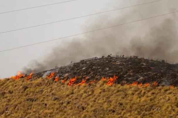 The image shows flames spreading along a hillside in the area affected by a forest fire that caused the death of at least 12 people near Bédar, in the Los Gallardos district, in the province of Almería, on July 11, 2026.