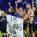 The Argentine team displays a banner with the slogan 'The Malvinas are Argentine' and faces a possible sanction