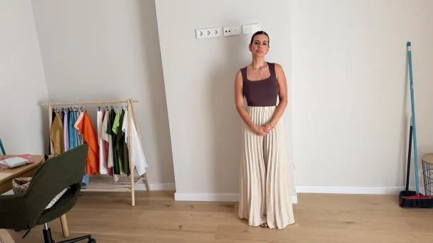 Bárbara Sanz next to the wall hiding a large colony of bats in her Sabadell home