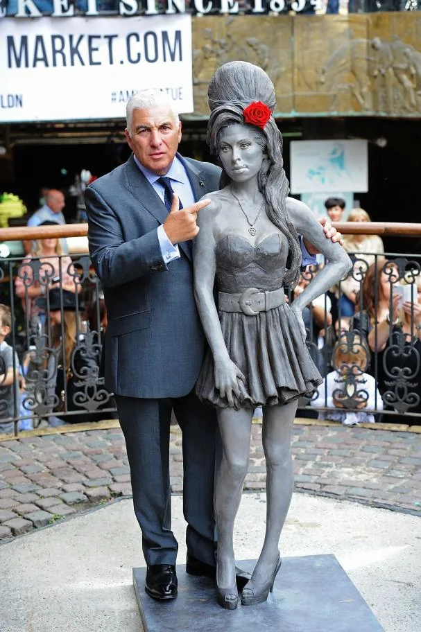 Amy Winehouse's father during the unveiling of the artist's statue in Camden Town in September 2014.
