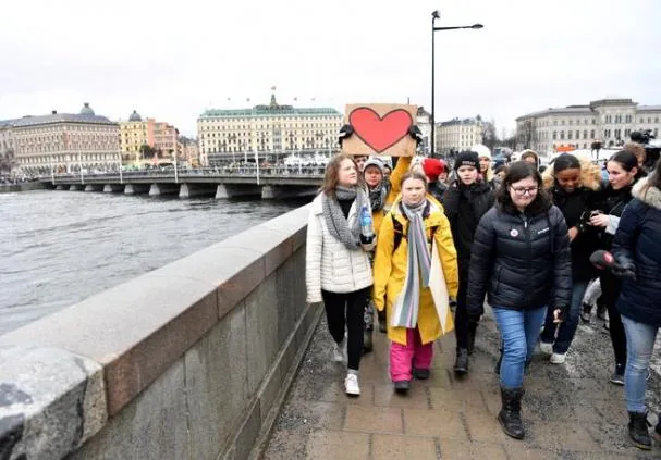 The young Swedish environmental activist Greta Thunberg with her sister Beata Thunberg in 2019 