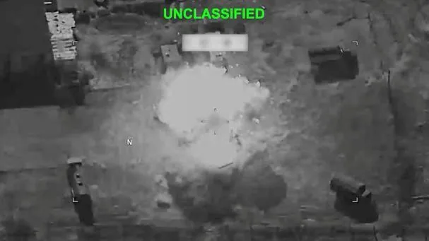 Smoke rises after an explosion at an unknown location, during what the U.S. Central Command (CENTCOM) describes as attacks against Iran