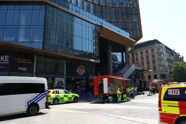 At least two dead and four missing in a fire at a building under construction in Brussels