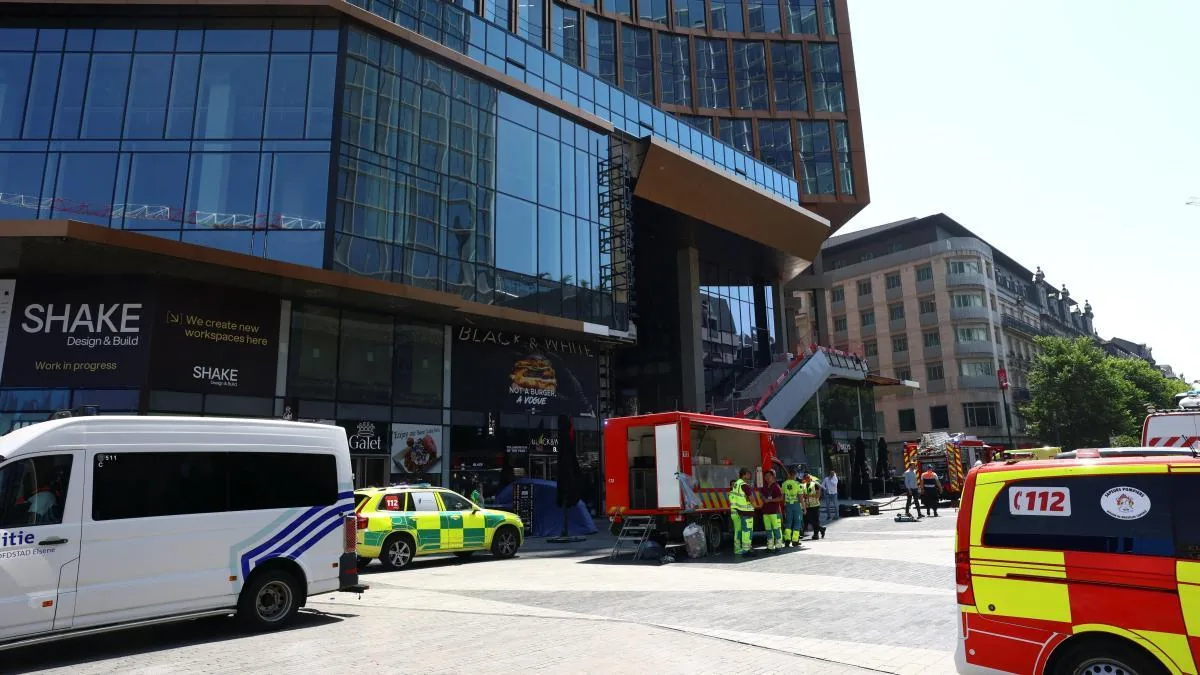 At least two dead and four missing in a fire at a building under construction in Brussels