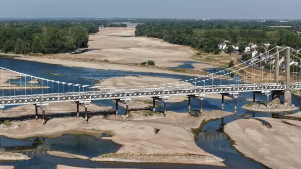 This aerial photograph shows a bridge over the Loire River in Loireauxence (Varades), western France, on July 10, 2026.