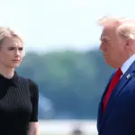 Who is Natalie Harp, the young blonde advisor who is always alongside Trump?