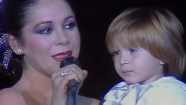 Isabel, with her little one of the soul.
