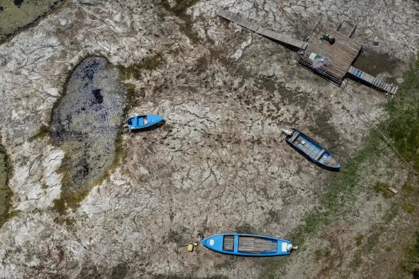 Vessels stranded on the dry bed of the Danube, in front of the Calafat-Vidin bridge connecting Bulgaria and Romania near the town of Antimovo, southeastern Bulgaria, on July 22, 2026