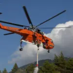 Two helicopters collide in Greece during firefighting efforts as the fire advances towards Athens