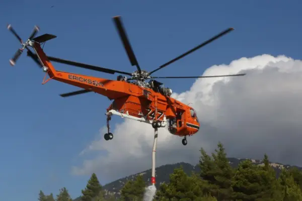 Two helicopters collide in Greece during firefighting efforts as the fire advances towards Athens