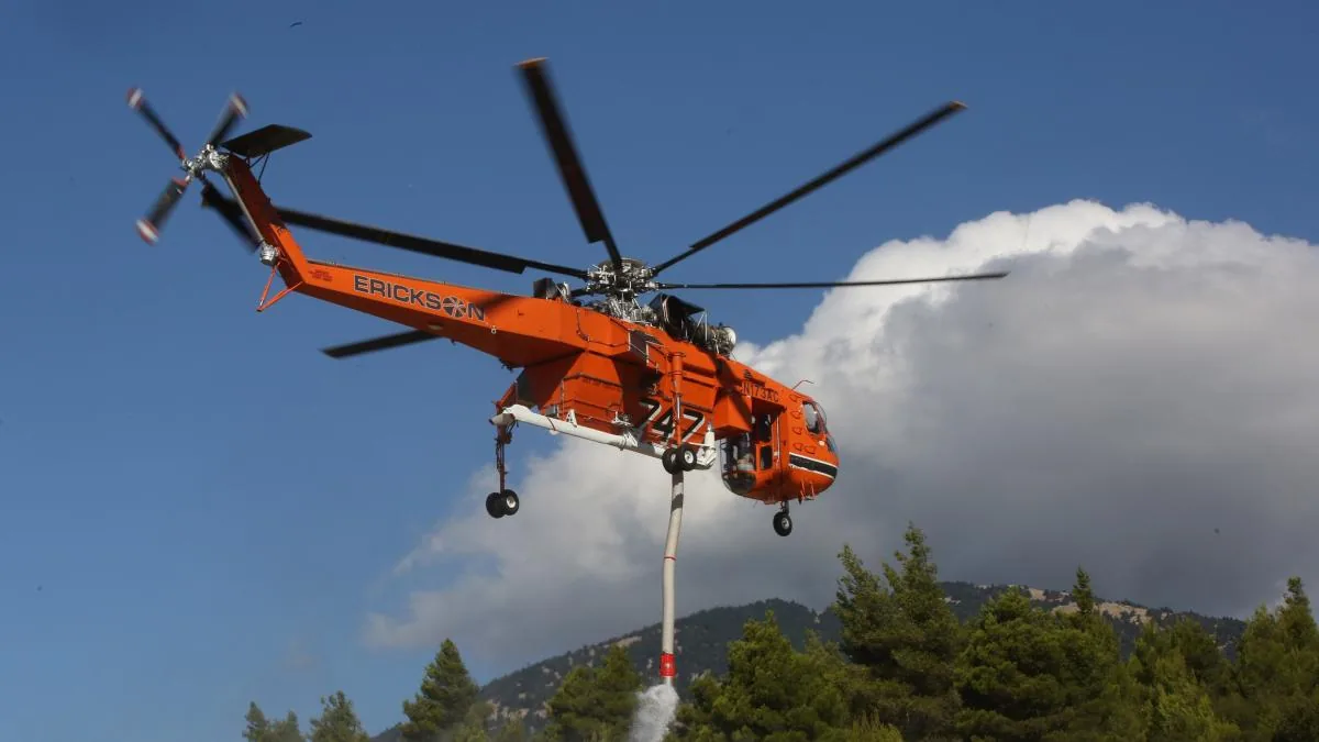 Two helicopters collide in Greece during firefighting efforts as the fire advances towards Athens