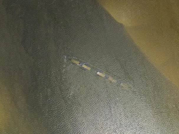 A drone image shows the remains of the Hungarian freighter Fulton, sunk in 1937, in the Danube River, near Opatovac 