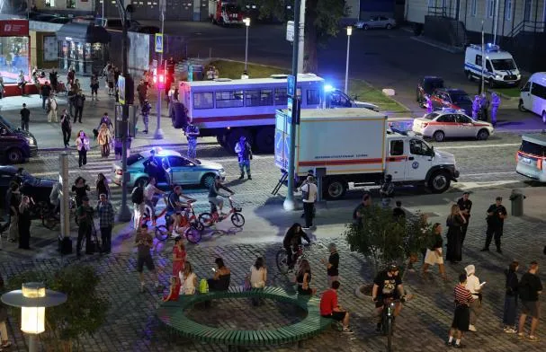 Law enforcement agents and emergency services personnel near the site of an explosion in a restaurant in downtown Moscow, Russia, on August 1, 2026.