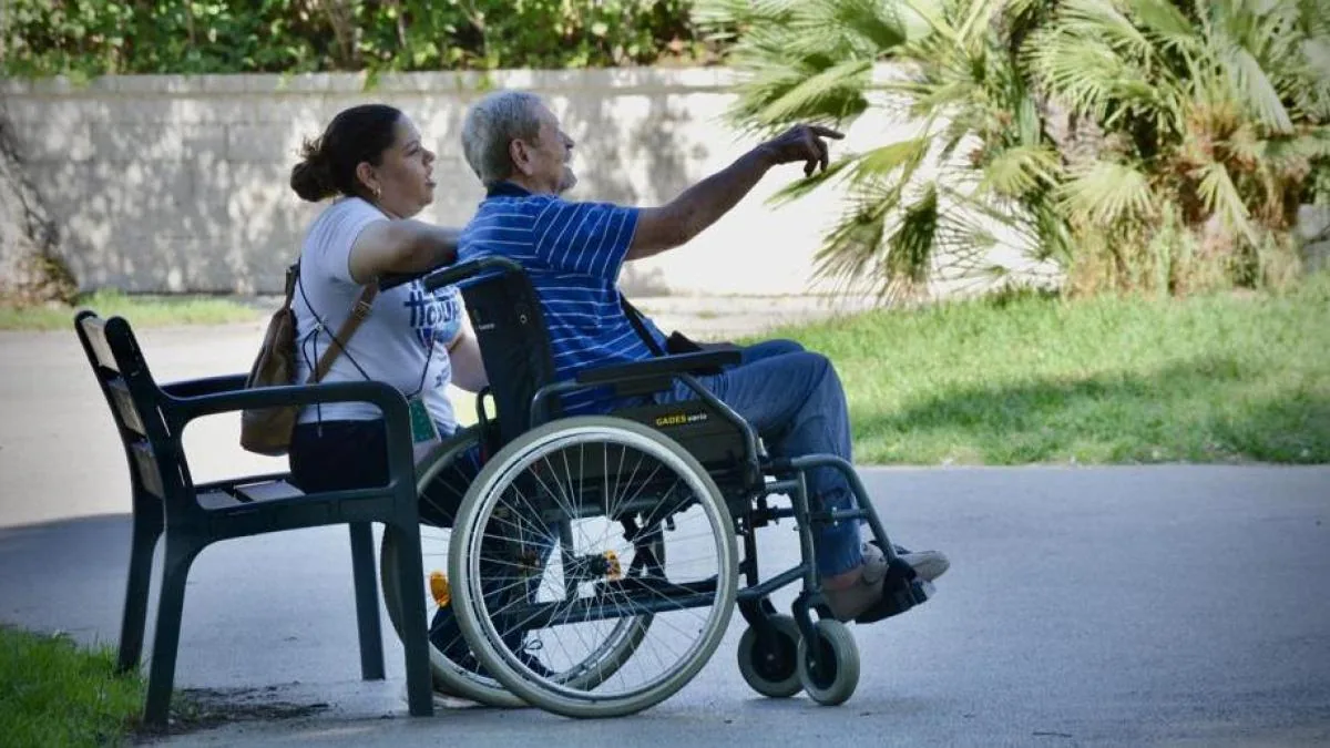 The dependent person may receive various aids and their caregiver may be a neighbor