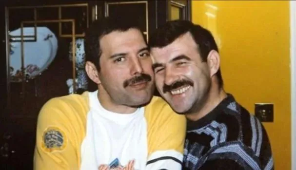 At his Garden Lodge home (London) with Jim Hutton, who stayed with him until he died in 1991, although his daughter denies they were a couple