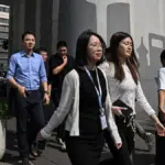 China imposes new restrictions on traveling abroad for "at-risk" groups